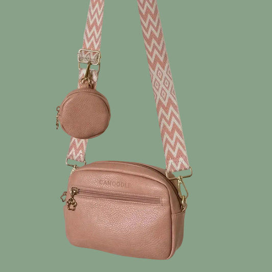 Nude Pink crossbody Dog walking bag with a matching Treat purse on a beige background