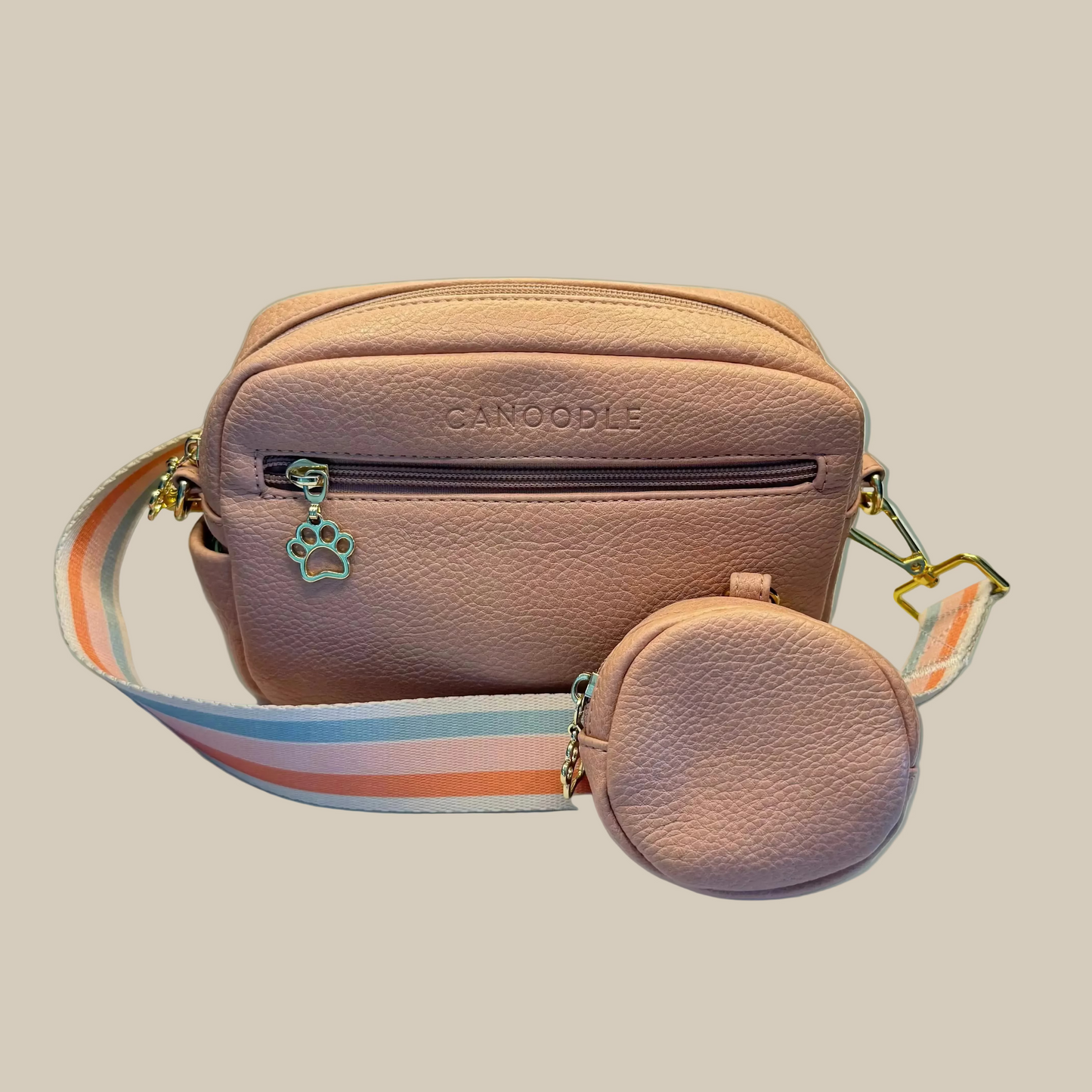 Newport crossbody strap on pink canoodle bag with matching round treat bag